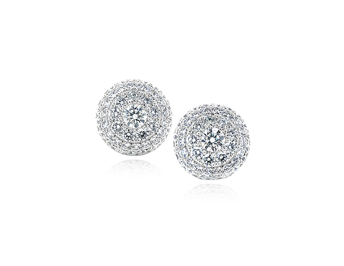 Round brilliant cut diamond earrings in 18k white gold.