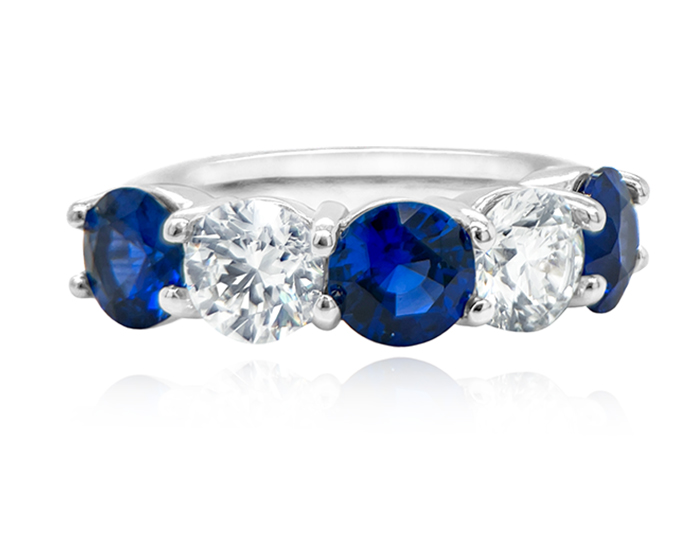 Sapphire and round brilliant cut diamond ring in platinum.