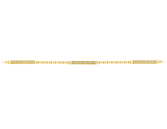 Round brilliant cut diamond bracelet in 18k yellow gold.