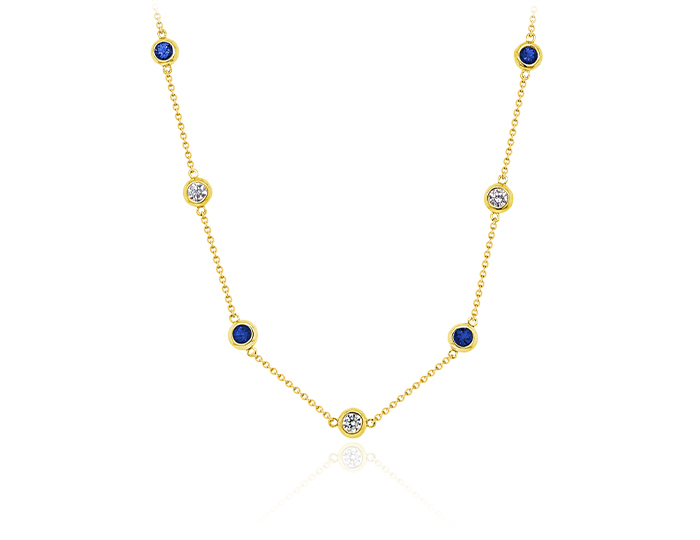 Sapphire and round brilliant cut diamond necklace in 18k yellow gold.