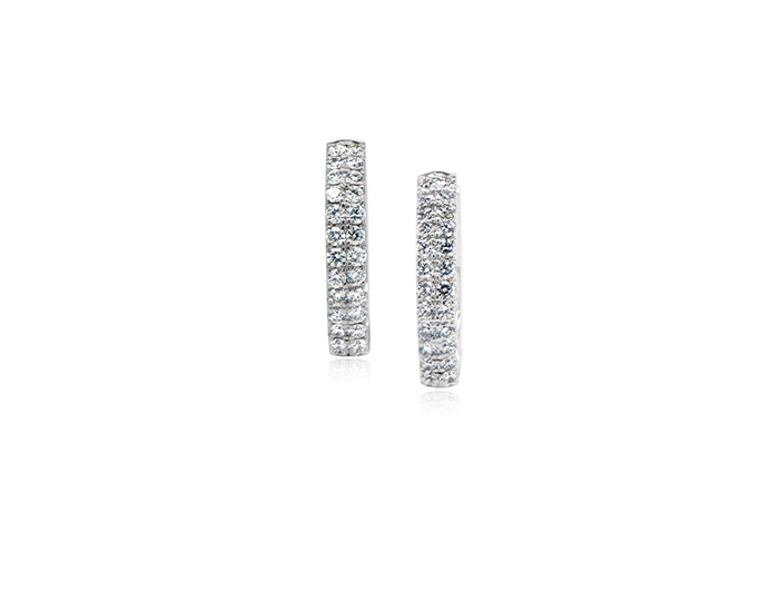 Round brilliant cut diamond huggie hoop earrings in 18k white gold.