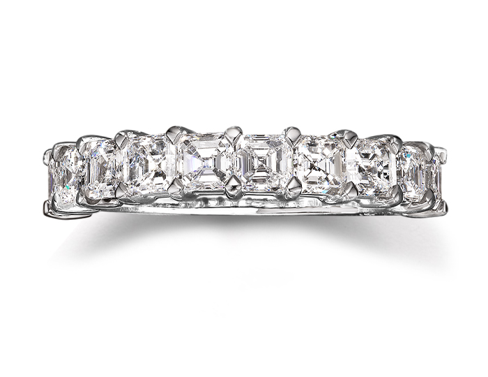 Asscher cut diamond band in platinum.