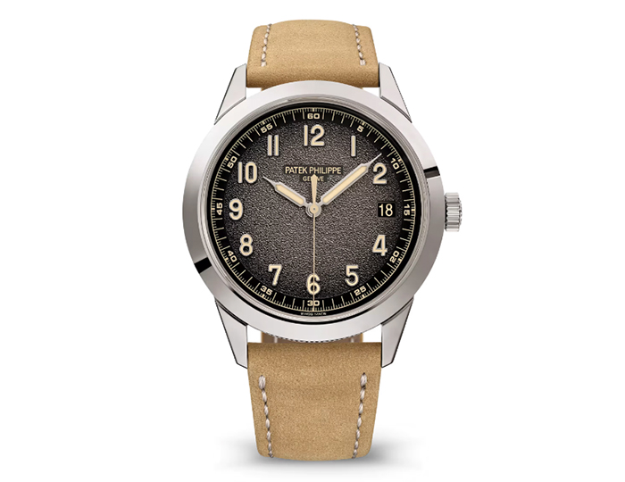 Patek Philippe Calatrava ref. 5226G-001 featuring a self-winding mechanical movement, textured charcoal gray dial, and a 40mm 18k white gold case with a hobnail case-middle on a calfskin strap with a prong buckle.