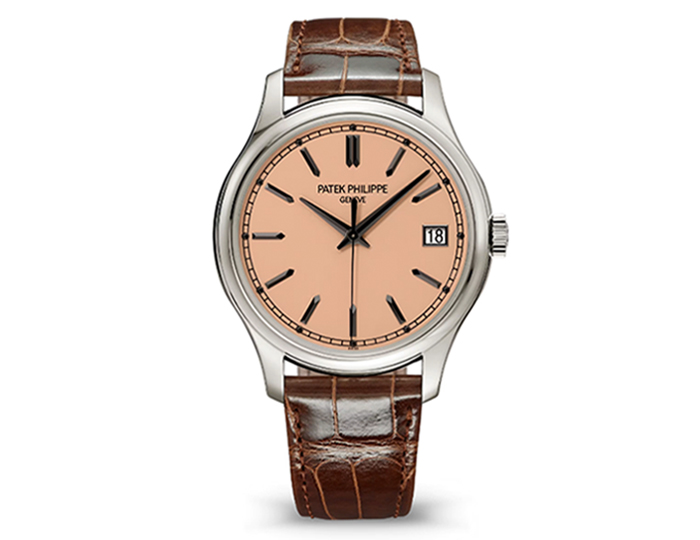 Patek Philippe Calatrava ref. 5227G-015 featuring a self-winding mechanical movement, rose gilt-opaline dial, 39mm 18k white gold case featuring a dust cover on an alligator strap with a prong buckle.