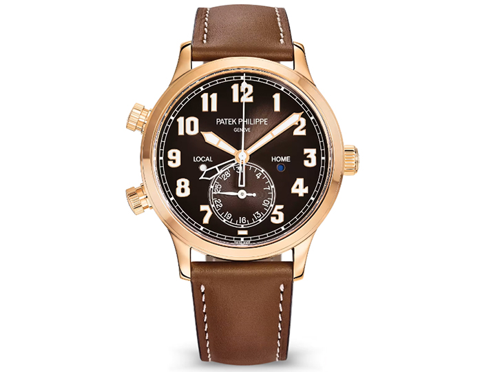 Patek Philippe Pilot Travel Time ref. 5524R-001 featuring a self-winding mechanical movement, sunburst brown dial, and a 42mm 18k rose gold case on a calfskin strap with a clevis prong buckle.