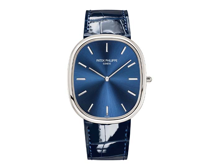 Patek Philippe Golden Ellipse, self-winding movement, 34.5x39.5mm case, platinum, blue gold sunburst dial, shiny navy blue alligator strap with a prong buckle. (5738P-001)