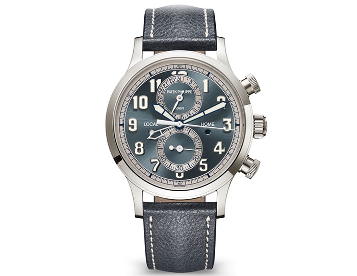 Patek Philippe Pilot Travel Time Chronograph mechanical self-winding watch featuring a blue-gray dial and an 18k white gold 42mm case on a clafskin vintage strap with clevis prong buckle. (5924G-001)