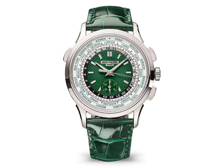 Patek Philippe World Time Chronograph ref. 5930P-001 feturing a self-winding mechanical movement, hand-guilloched green opaline dial, and a 39.5mm platinum case on an alligator strap with a fold-over clasp.