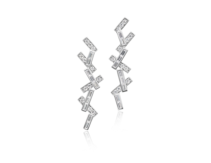 Baguette and round brilliant cut diamond earrings in 18k white gold.