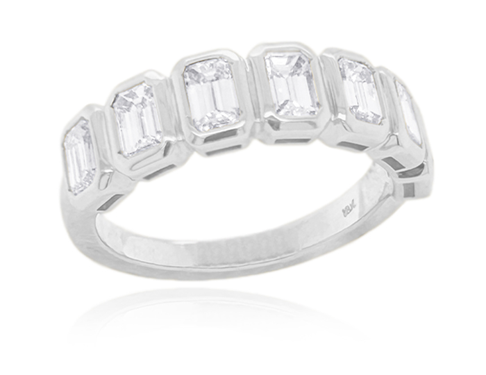 Emerald cut diamond band in platinum.