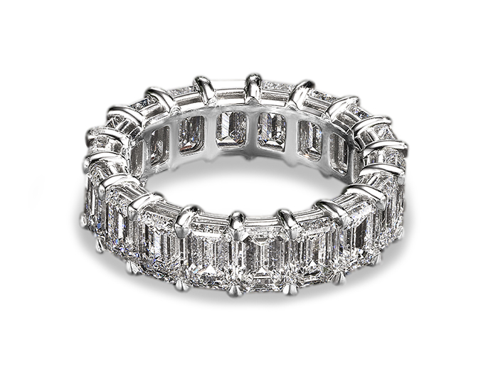 Emerald cut diamond eternity band in platinum.