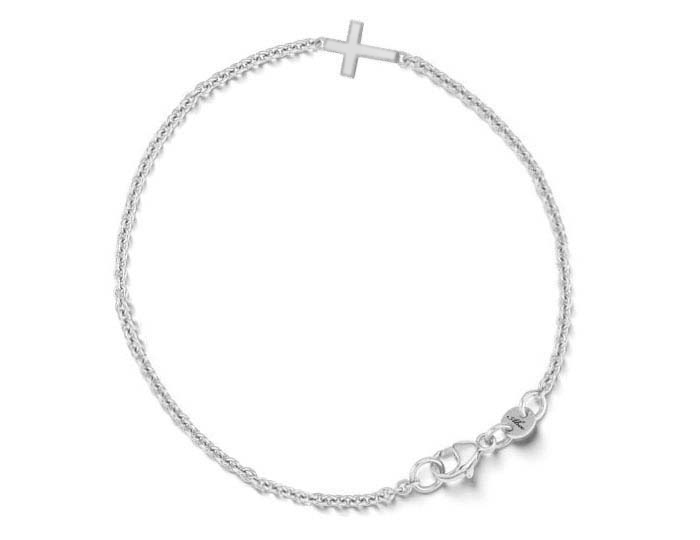 Cross bracelet in 14k white gold.