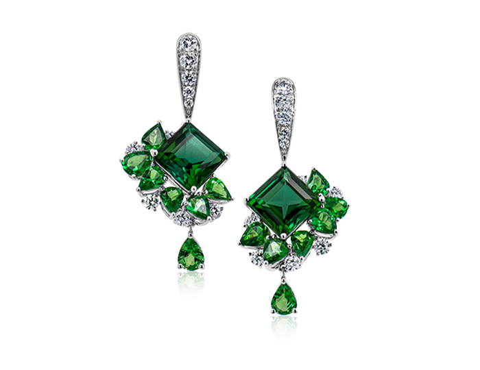Green tourmaline, tsavorite and round brilliant cut diamond earrings in 18k white gold.