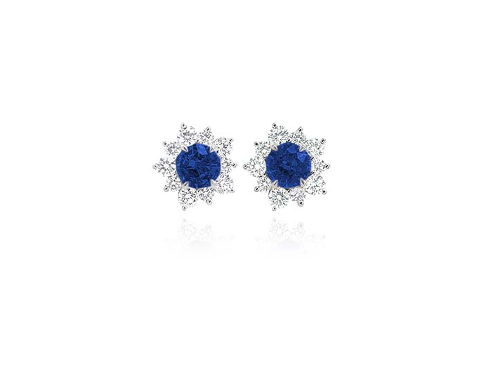 Sapphire and round brilliant cut diamond earrings in 18k white gold.