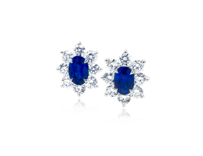 Sapphire and round brilliant cut diamond earrings in 18k white gold.