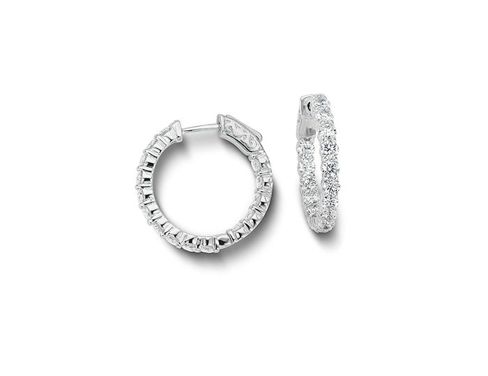 Round brilliant cut diamond hoop earrings in 18k white gold.