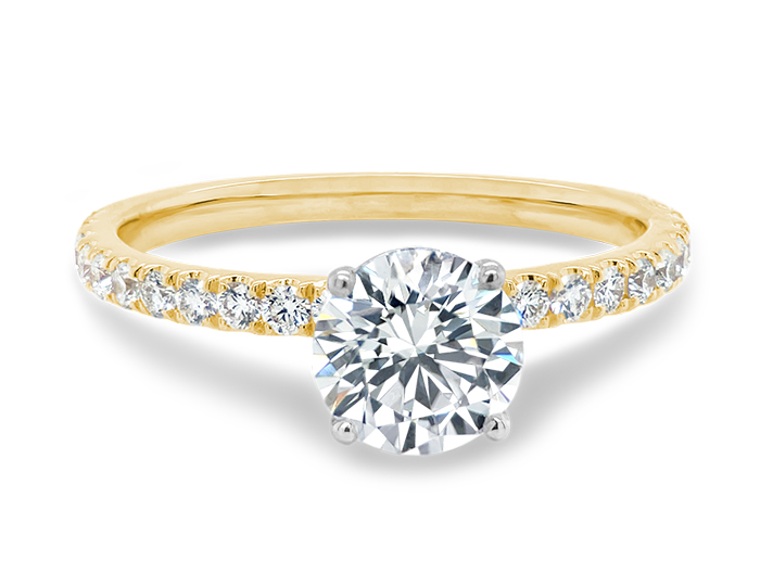 Round brilliant cut diamond engagement ring in 18k yellow gold.