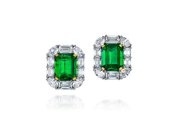 Emerald, oval and emerald cut diamond earrings in 18k white and yellow gold.
