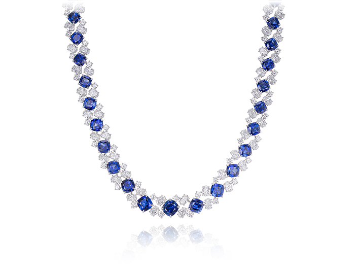 Cushion sapphire, oval and round brilliant cut diamond necklace in 18k white gold.