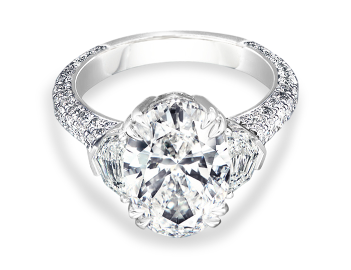 Oval, cadillac and round brilliant cut diamond engagment ring in plaitnum.