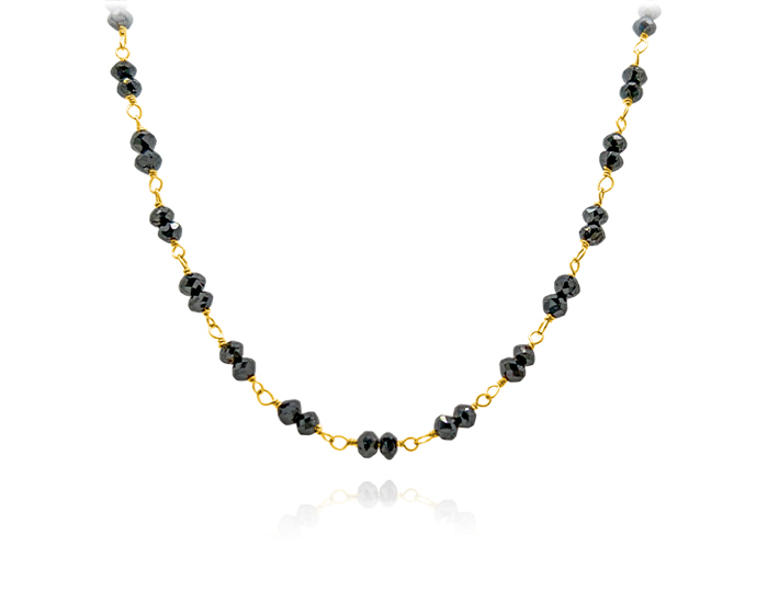 Black diamond beaded necklace in 18k yellow gold.