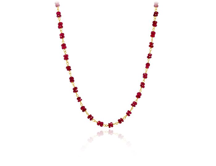 Ruby beaded necklace in 18k yellow gold.