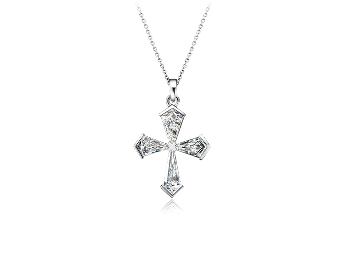 Kite shape cut diamond cross pendant in 18k white gold.
