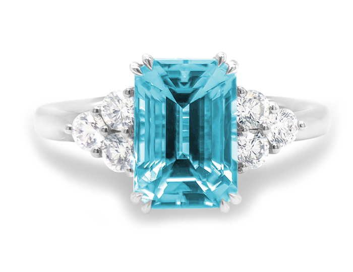 Aquamarine and round brilliant cut diamond ring in 18k white gold.
