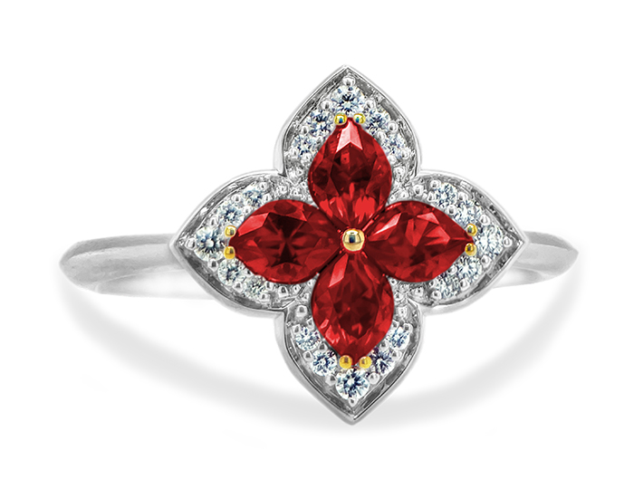 Pear shape rubies and round brilliant cut diamond ring in 18k white and rose gold.