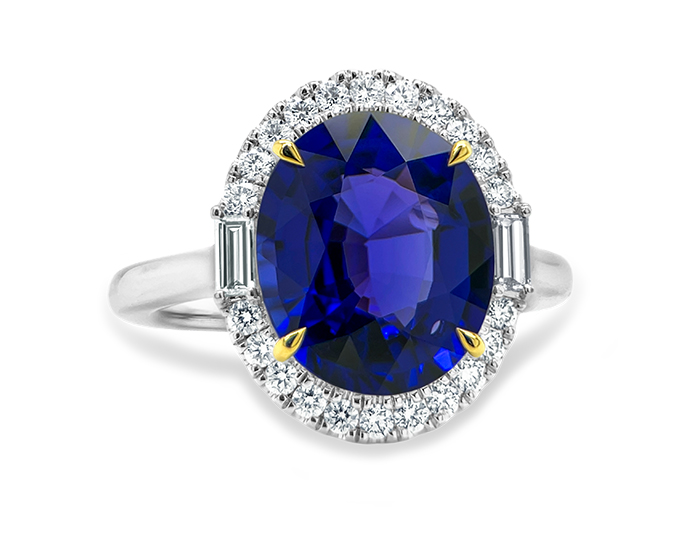 Oval tanzanite, baguette and round brilliant cut diamond ring in 18k white gold.