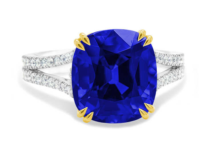 Tanzanite and round brilliant cut diamond ring in 18k white gold.