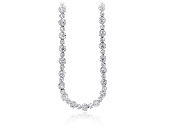 Round brilliant cut diamond necklace in 18k white gold.