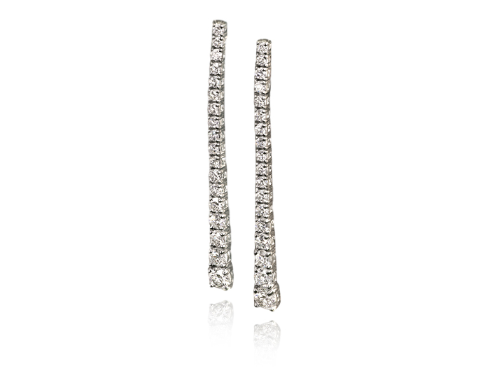 Round brilliant cut diamond earrings in 18k white gold.