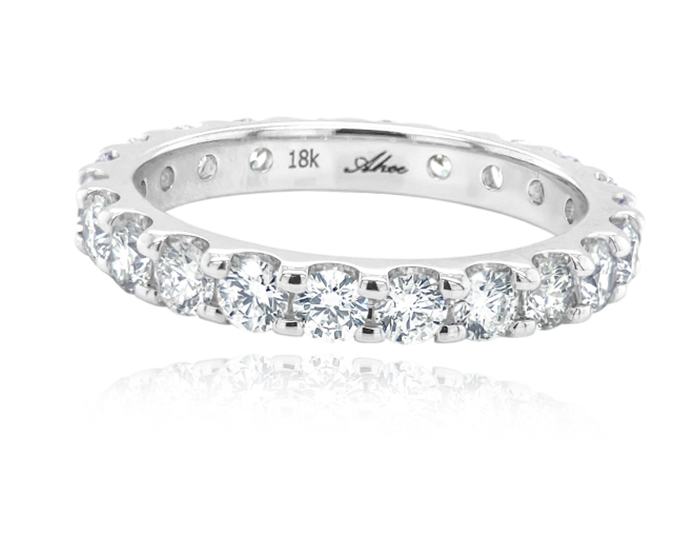 Round brilliant cut diamond band in 18k white gold.