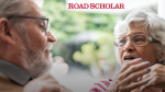 Two older people talking