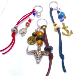 Keychains with leather string and beads with sports, animal and ocean themes