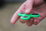 hand holding a fidget spinner