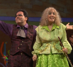 Man and woman in costume performing