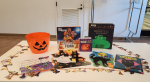 Table of children's Halloween books and decorations