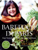 Barefoot in Paris Book Cover with a woman holding bread and lettuce