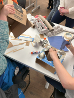 kids making crafts from recycled cardboard, paper, crayons, egg cartons and more