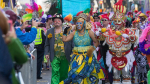 parade of people in colorful outfits 