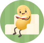 Bean sitting in a comfy chair with eyes and limbs reading a book