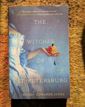 Book cover of The Witches of St. Petersburg by Imogen Edward-Jones decorated with rhinestones