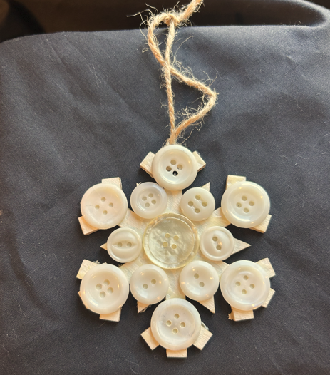 Snowflake made out of buttons