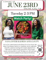 The authors laugh next to a copy of their cookbook.