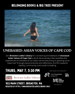 A woman stands in the ocean surf.