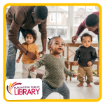 a toddler walks towards two adults