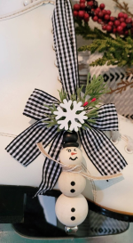 Wood Bead Snowman hanging by buffalo check ribbon