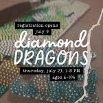 a diamond painted dragon bookmark and keychain
